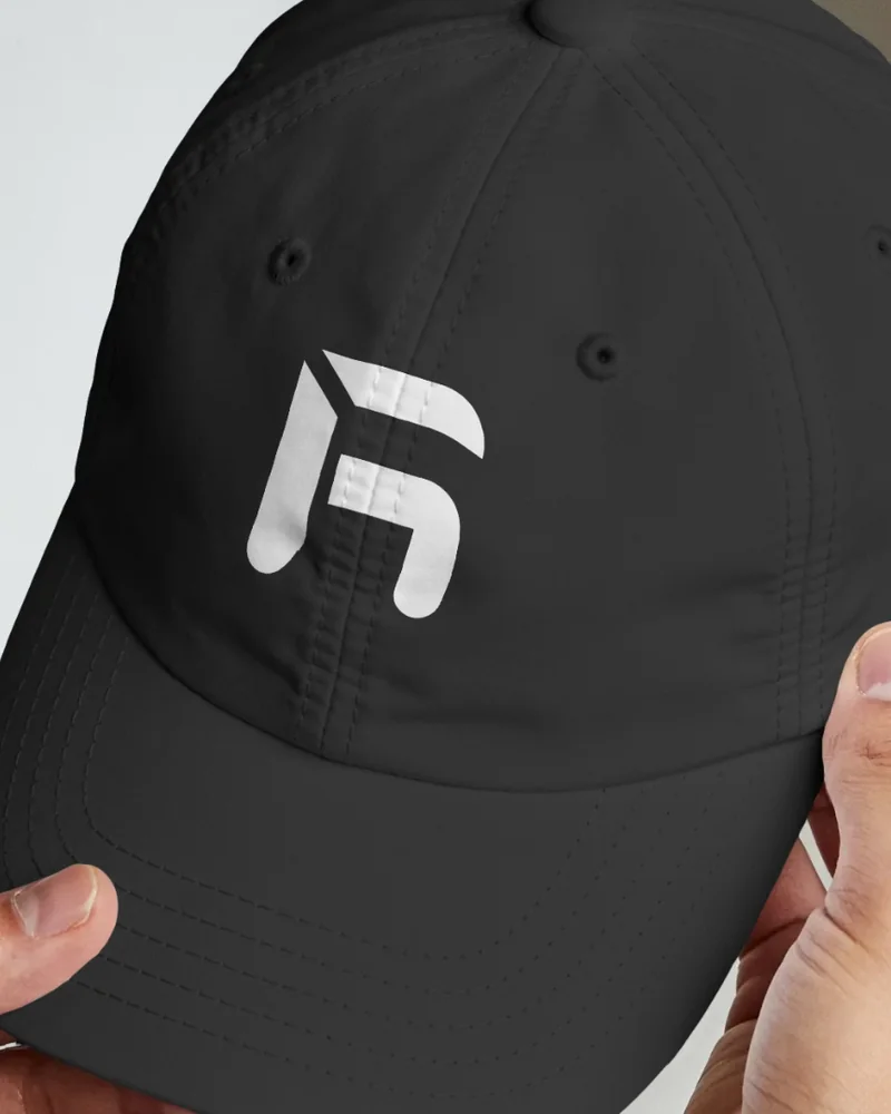 Black six-panel cap with the hex mark on the front