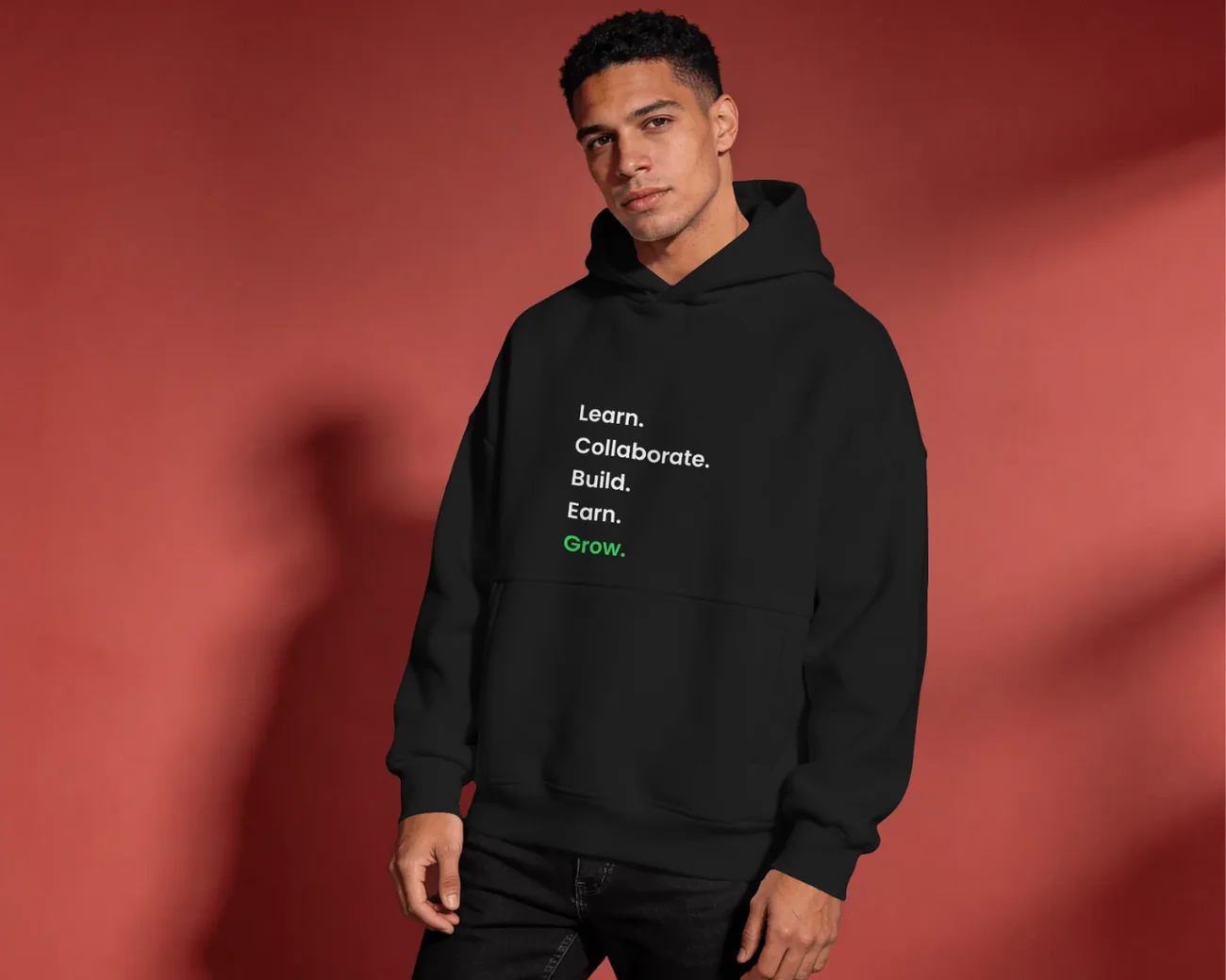 Person wearing the black Manifesto Hoodie